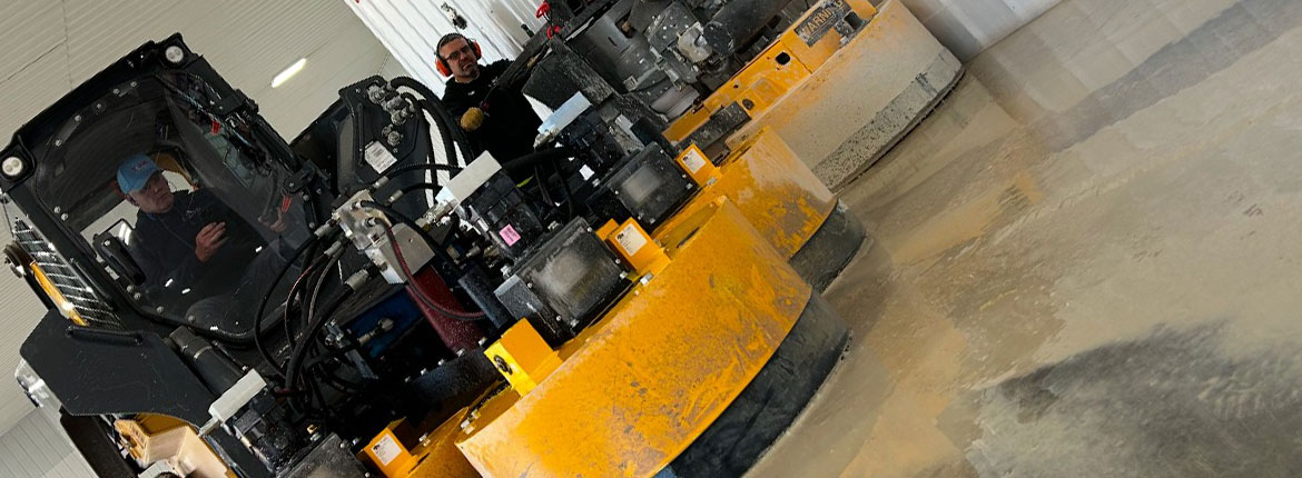 A concrete floor polishing tractor