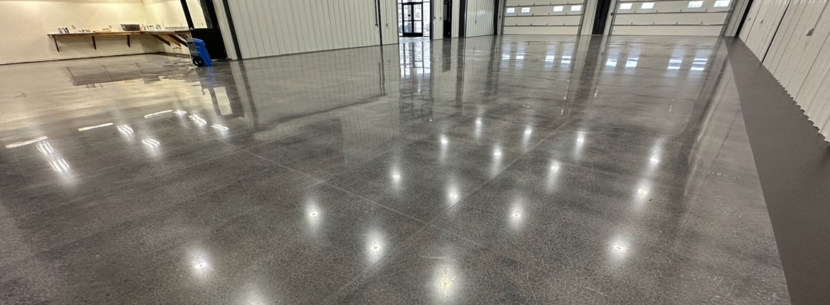 A shiny polished concrete warehouse floor