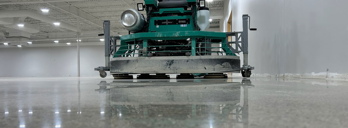 a machine polishing a concrete floor